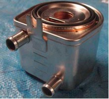 Теплообмінник масляного фільтра Чері Тігго